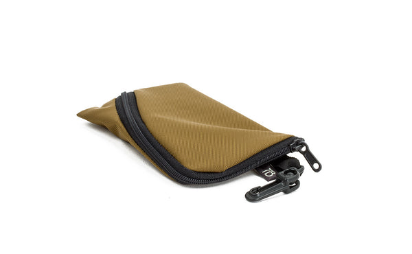 A Mini Ghost Whale Pouch in Coyote (golden tan)
